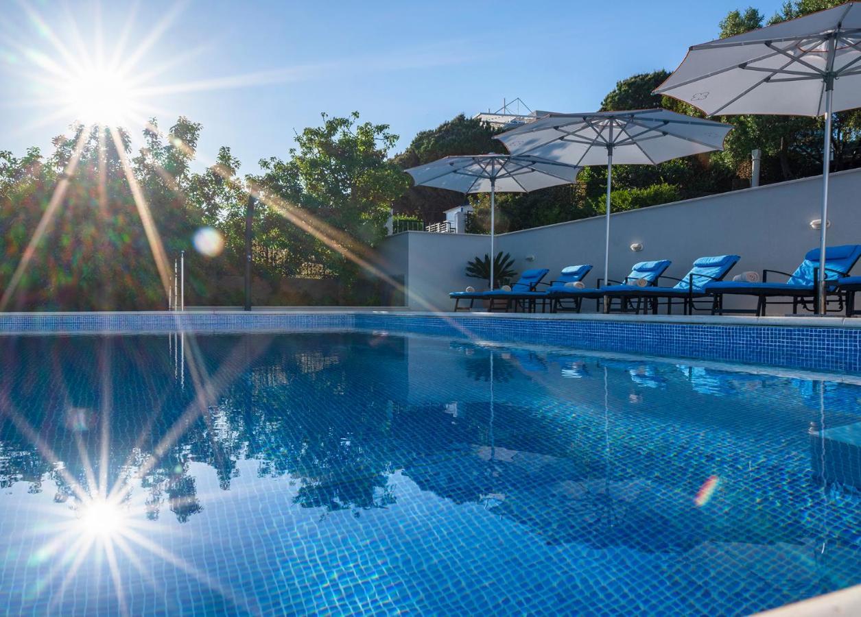 ホテル サン ガーデンズ ドゥブロブニク オラサック エクステリア 写真 The swimming pool at the hotel
